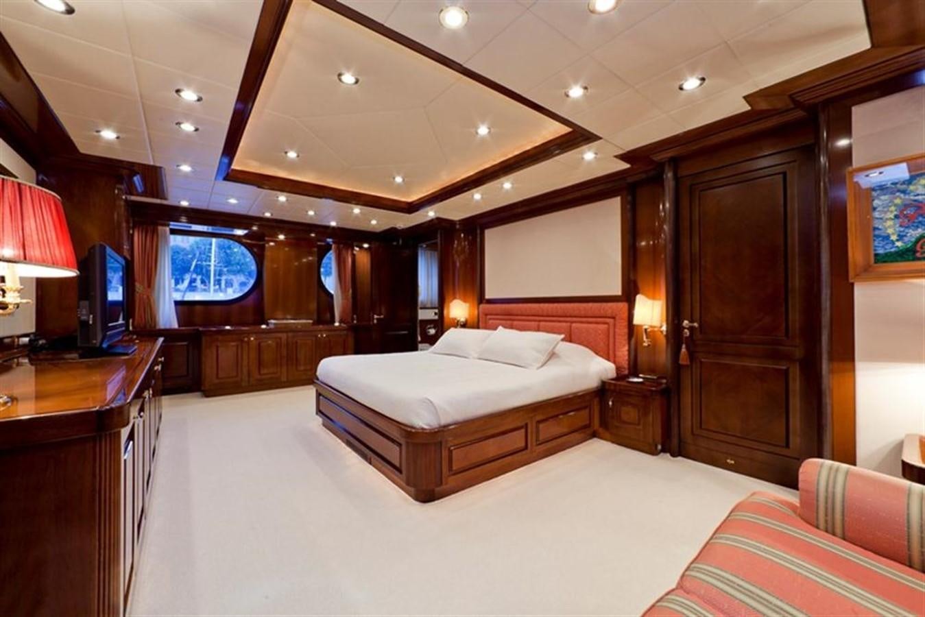 a room with a bed and a tv aboard SOPHIE BLUE Yacht for Sale