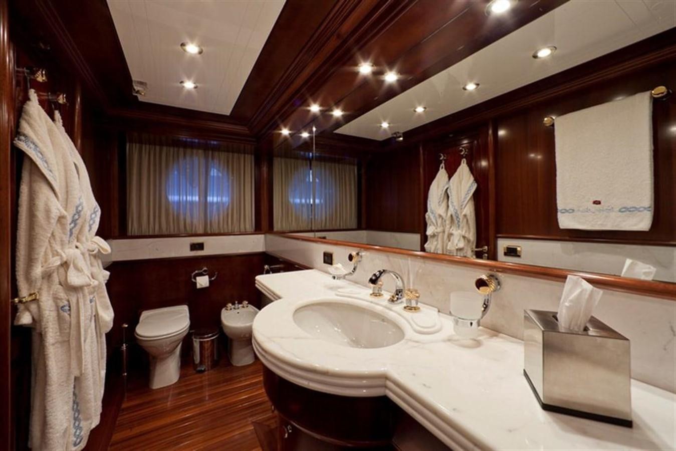 a bathroom with a large mirror aboard SOPHIE BLUE Yacht for Sale