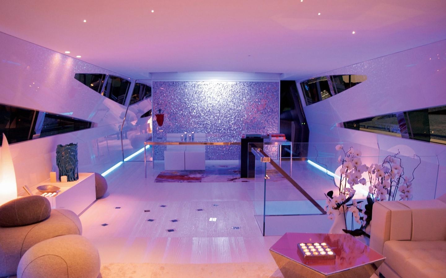 a room with a large glass wall aboard FLYING DAGGER Yacht for Sale