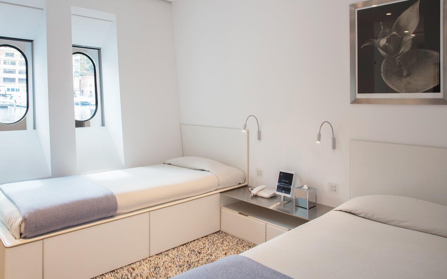 a room with two beds aboard FLYING DAGGER Yacht for Sale