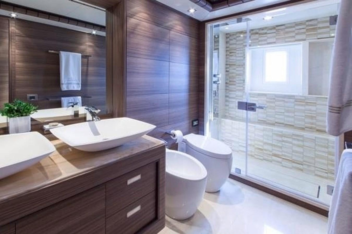 a bathroom with a sink and a toilet aboard ORYX Yacht for Sale