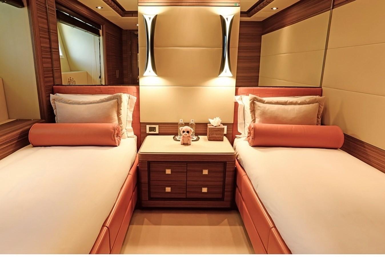 a room with two beds aboard ORYX Yacht for Sale