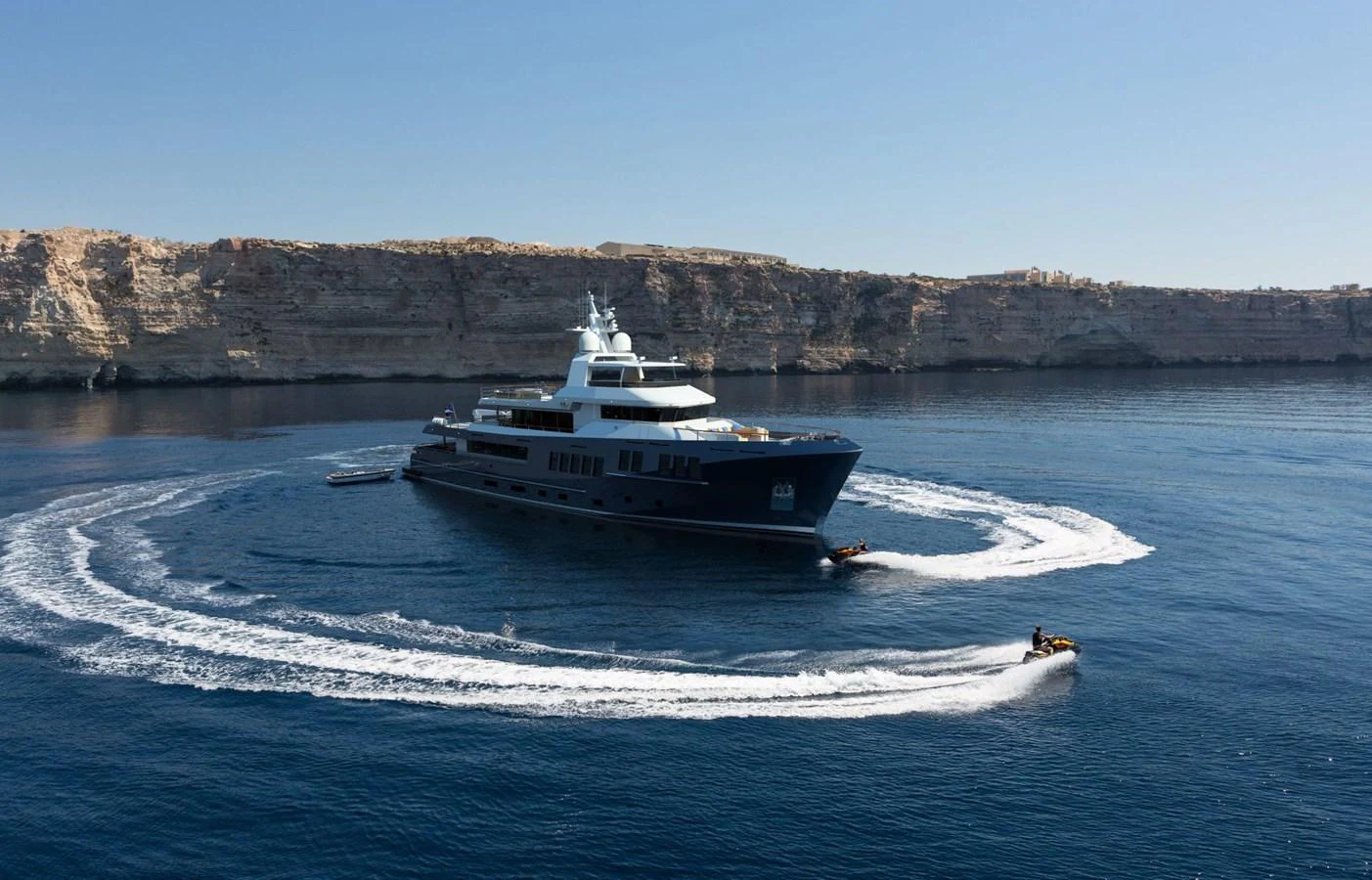 a boat on the water aboard BERING B130 Yacht for Sale