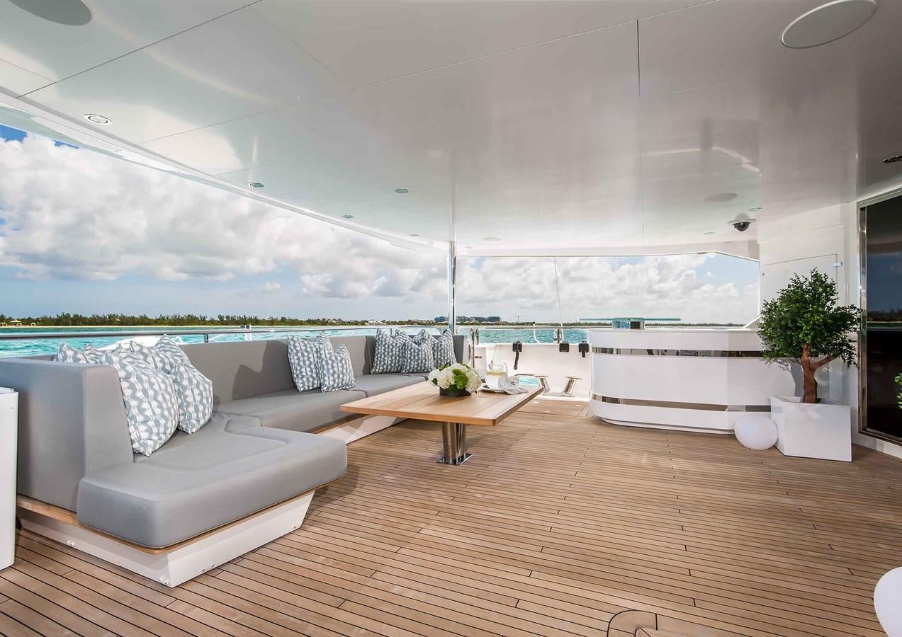 a living room with a large window aboard CAPTAIN MORGAN III Yacht for Sale