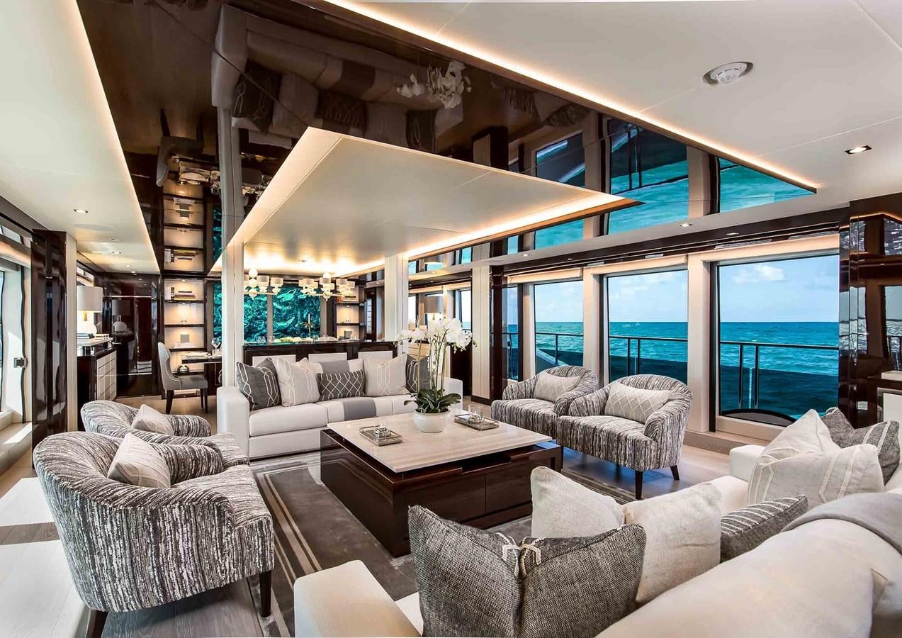 a living room with a large window aboard CAPTAIN MORGAN III Yacht for Sale