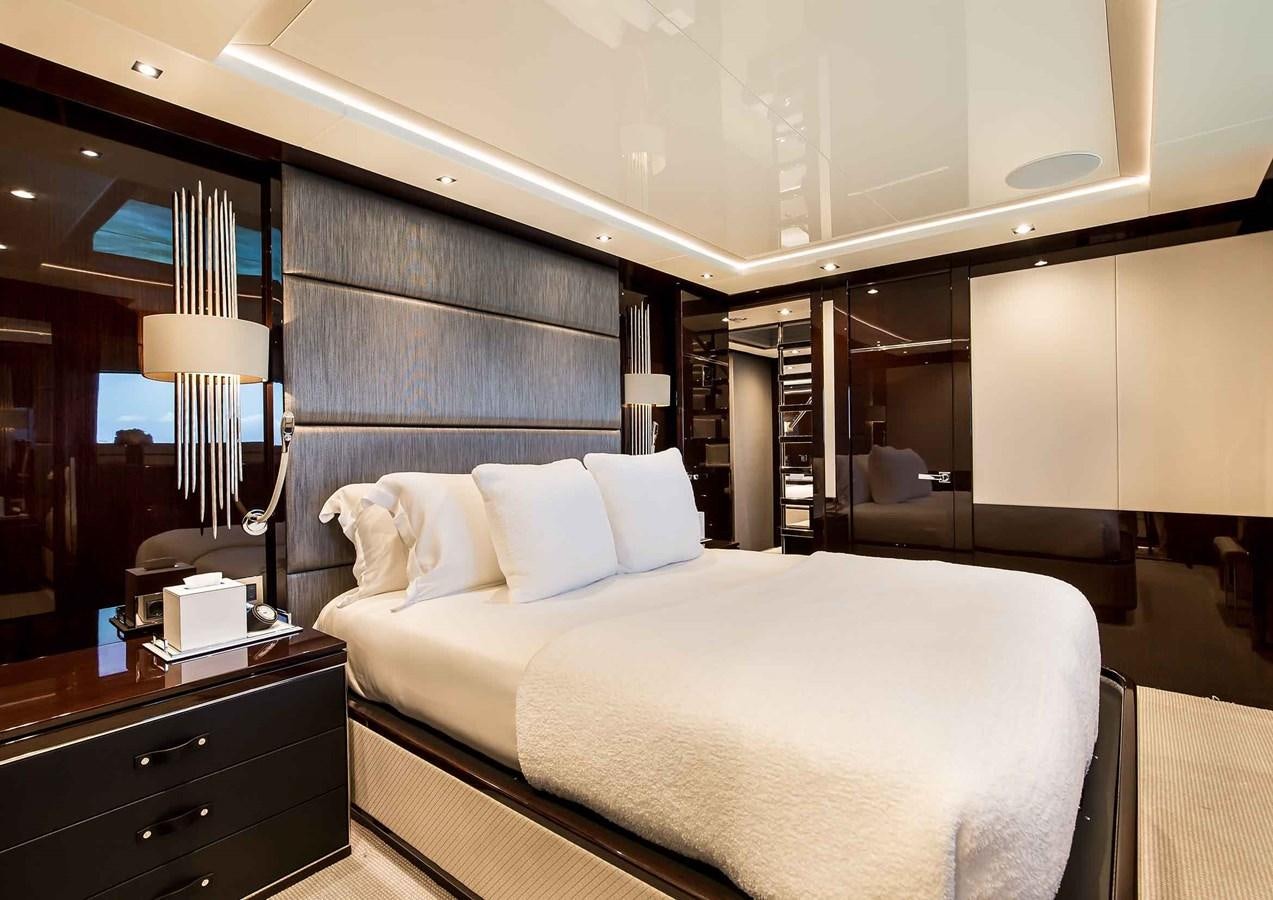 a hotel room with a bed aboard CAPTAIN MORGAN III Yacht for Sale