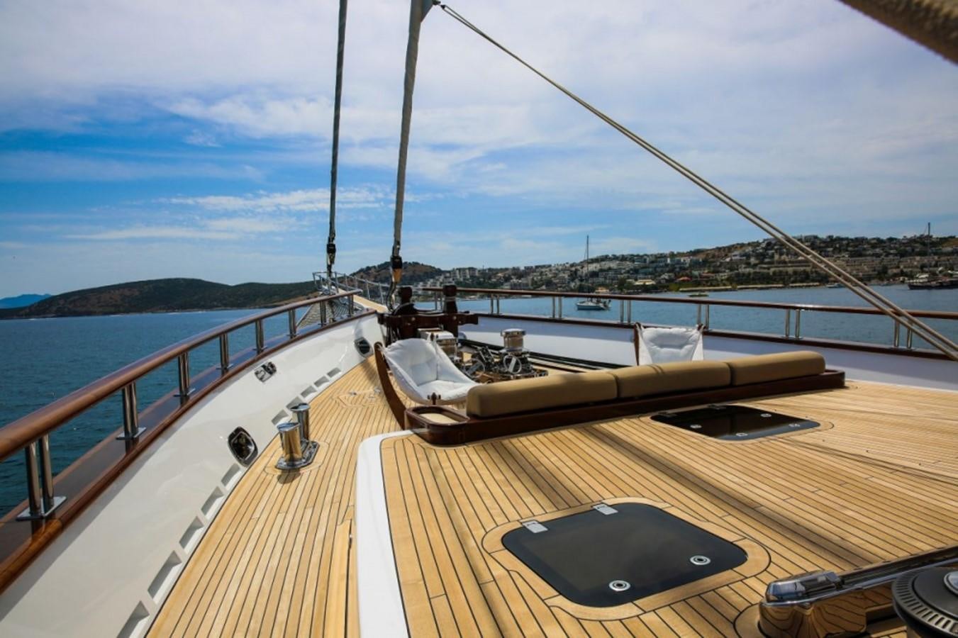 a deck with a boat on it aboard ZANZIBA Yacht for Sale
