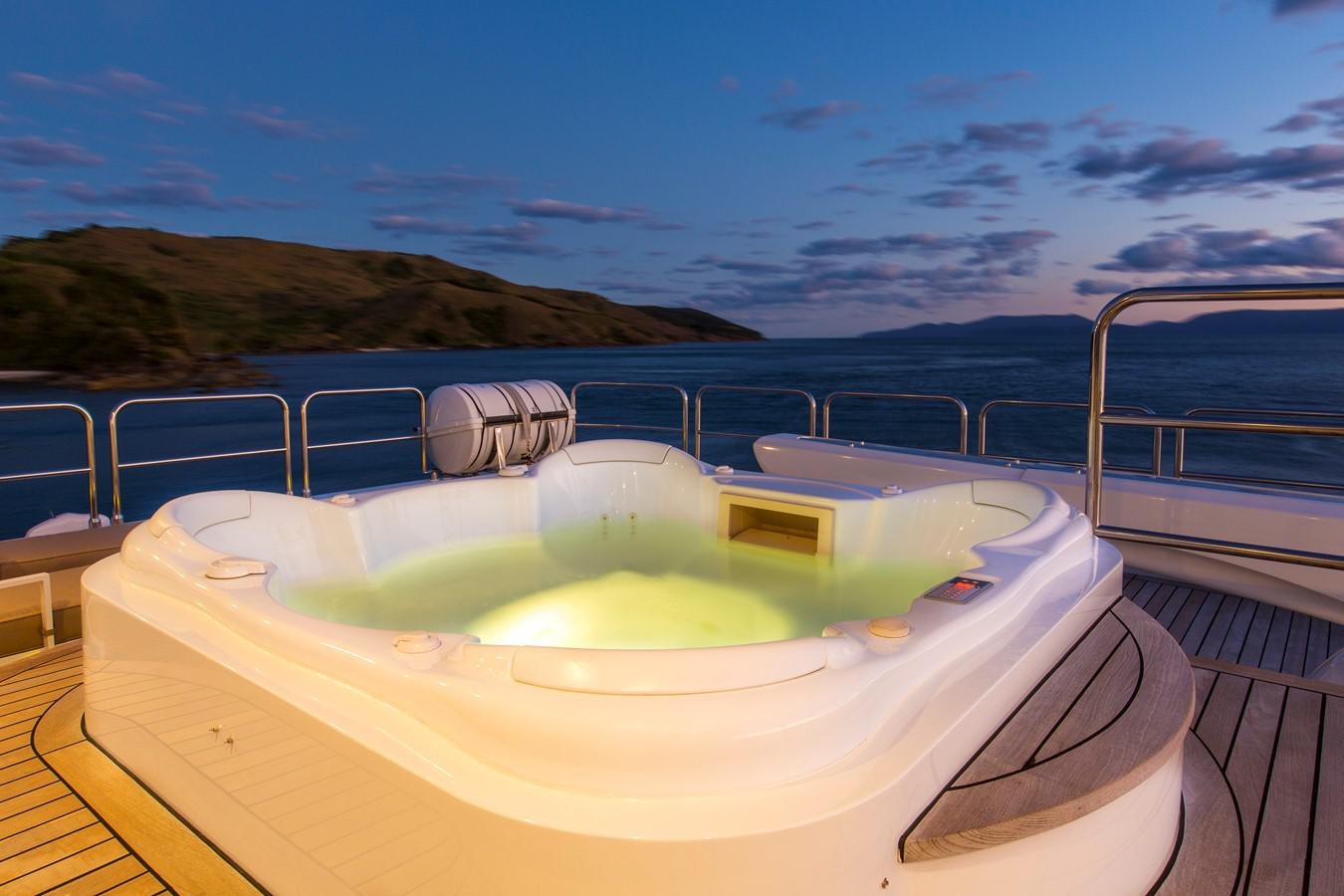 a large swimming pool aboard SILENTWORLD Yacht for Sale