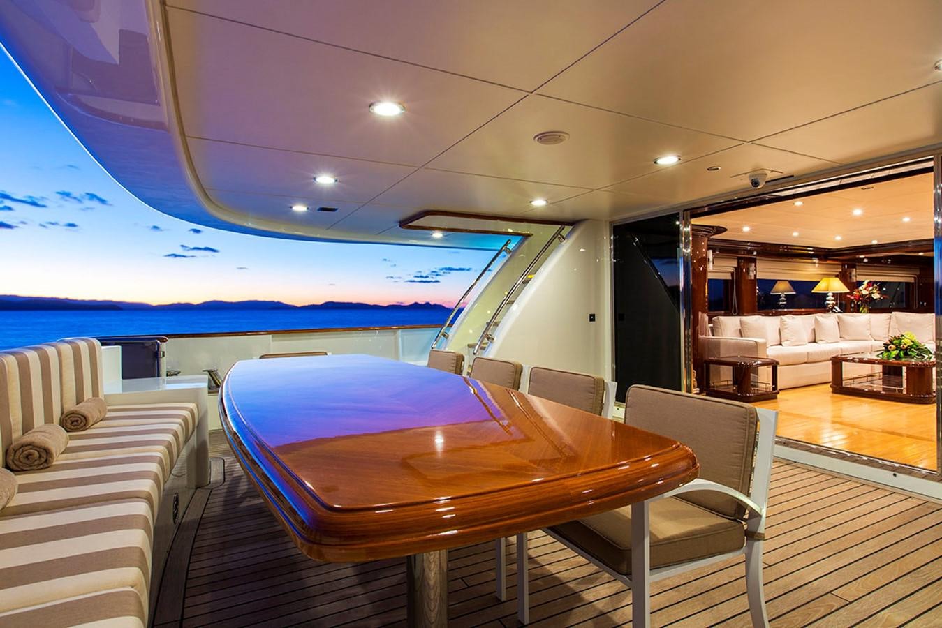 a table and chairs in a room aboard SILENTWORLD Yacht for Sale