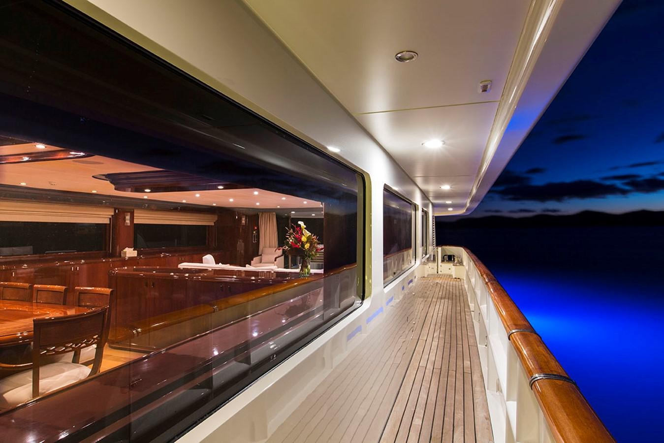 a train with a wood deck aboard SILENTWORLD Yacht for Sale