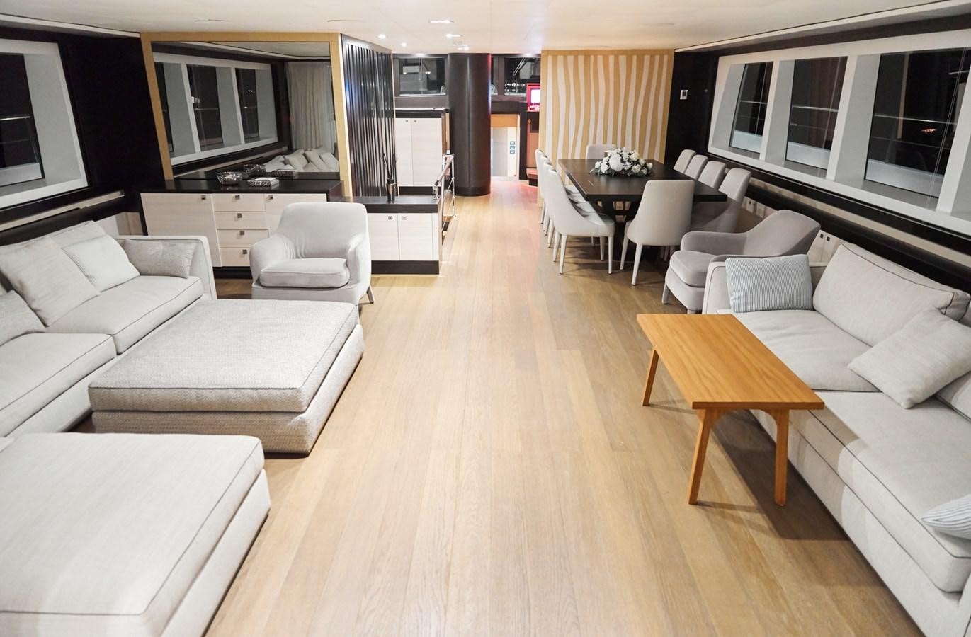a living room with a wood floor aboard NORTH STAR Yacht for Sale