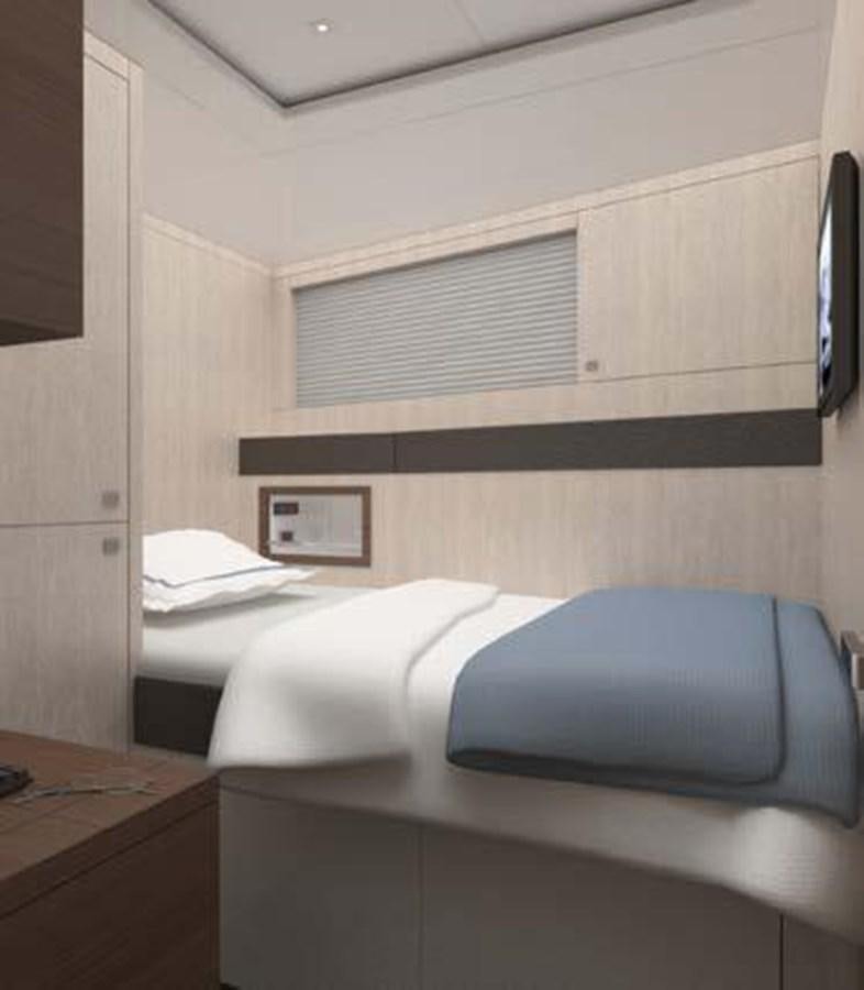 a room with a bed and a desk aboard NORTH STAR Yacht for Sale