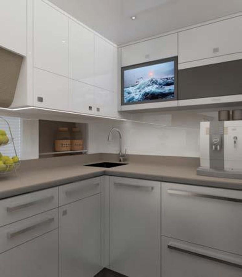 a kitchen with white cabinets aboard NORTH STAR Yacht for Sale