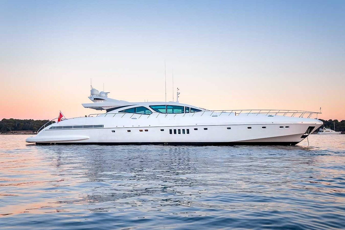 a white yacht on the water aboard BEACHOUSE Yacht for Sale