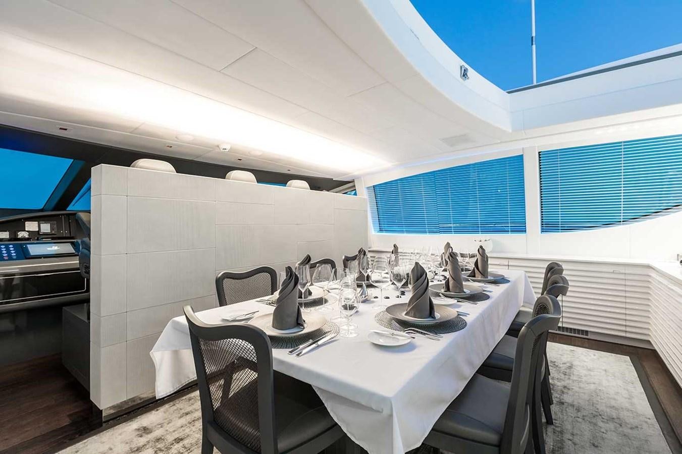 a table set for a dinner aboard BEACHOUSE Yacht for Sale