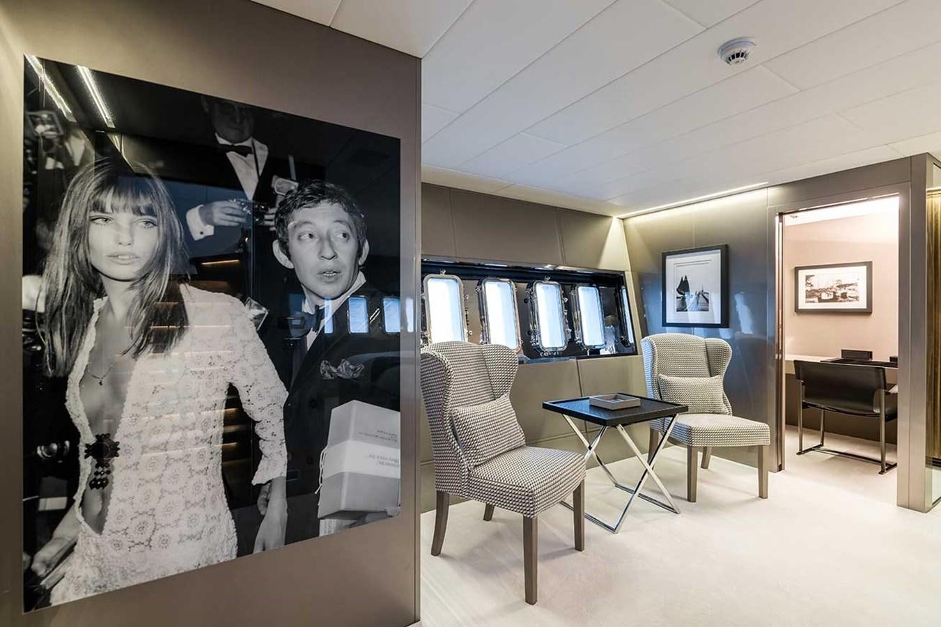 Serge Gainsbourg et al. in a room aboard BEACHOUSE Yacht for Charter