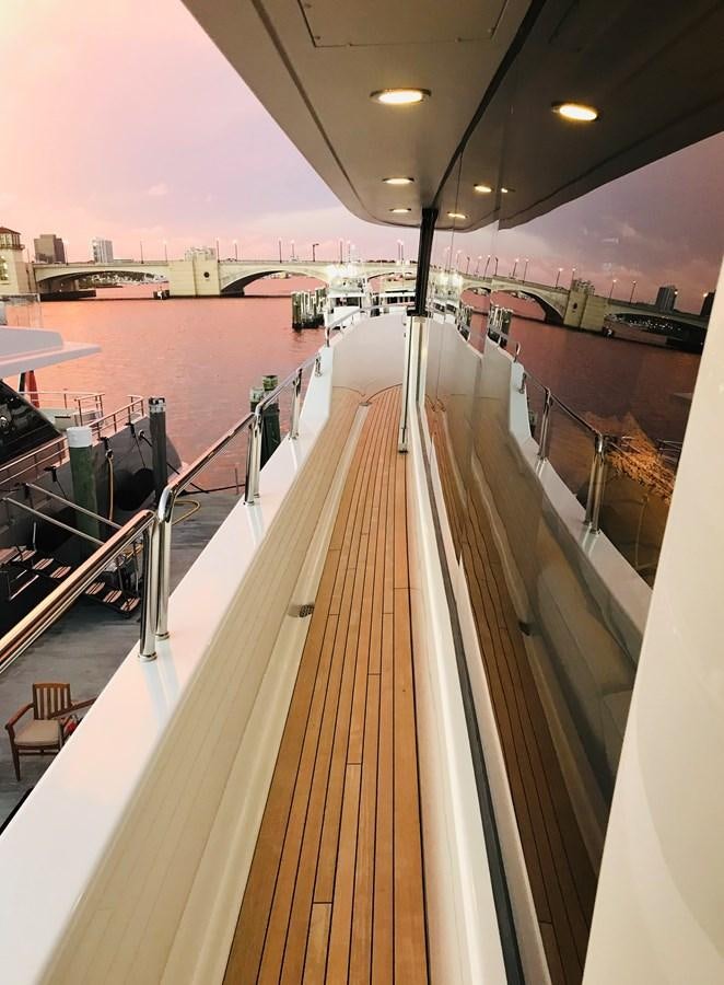 a large building with a large deck aboard RELENTLESS Yacht for Sale