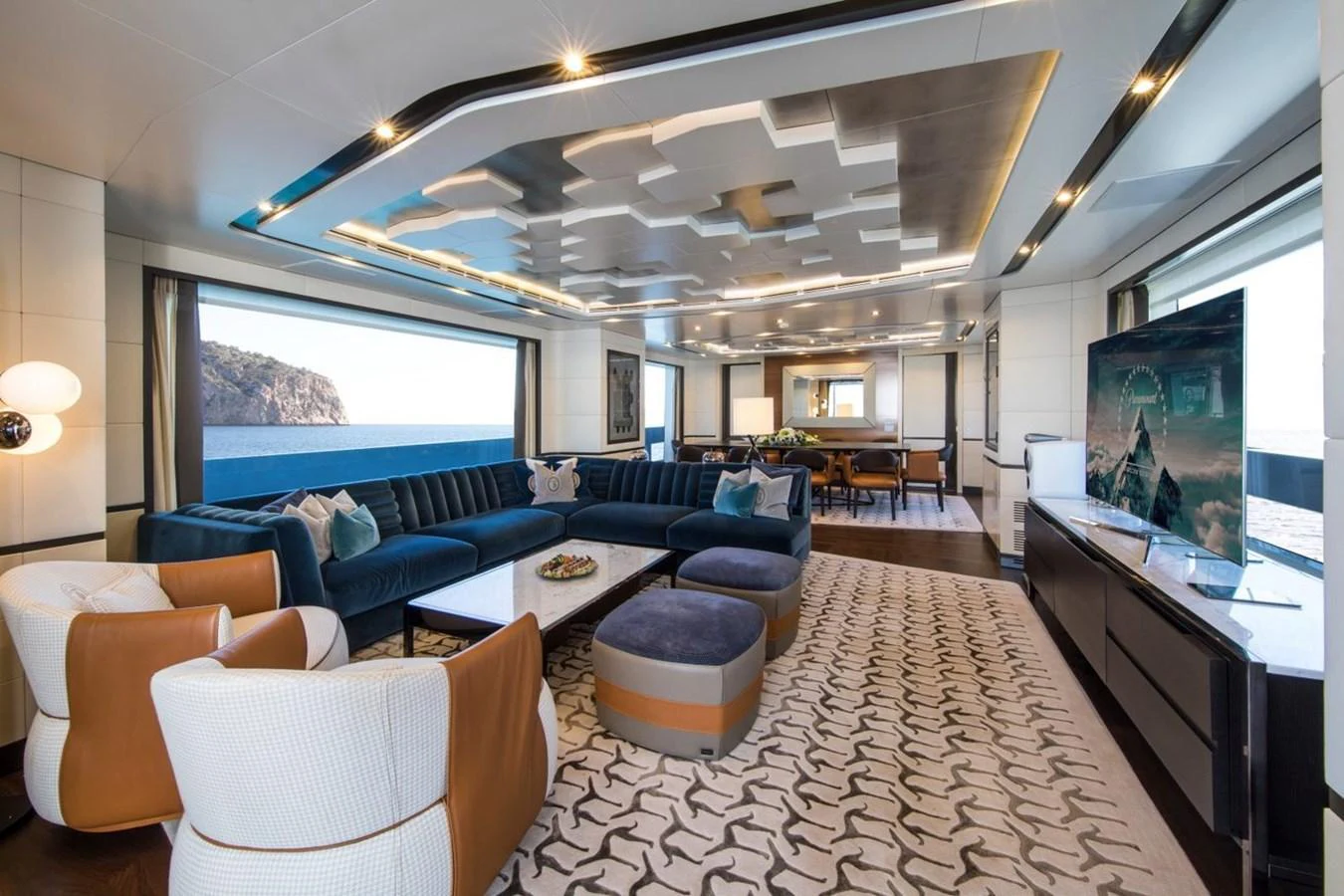 a living room with a large screen aboard SPRING Yacht for Sale