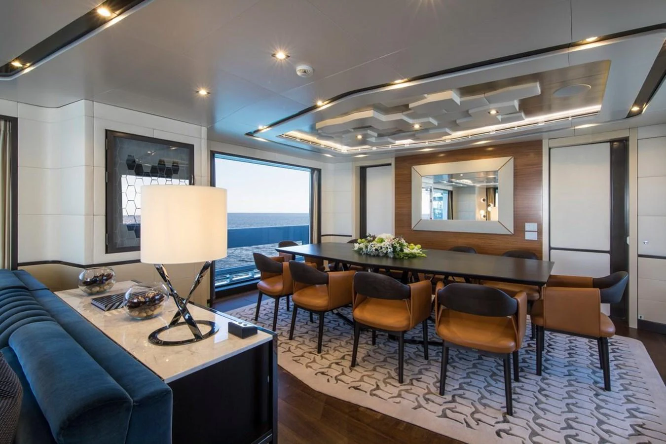 a room with a table and chairs aboard SPRING Yacht for Sale