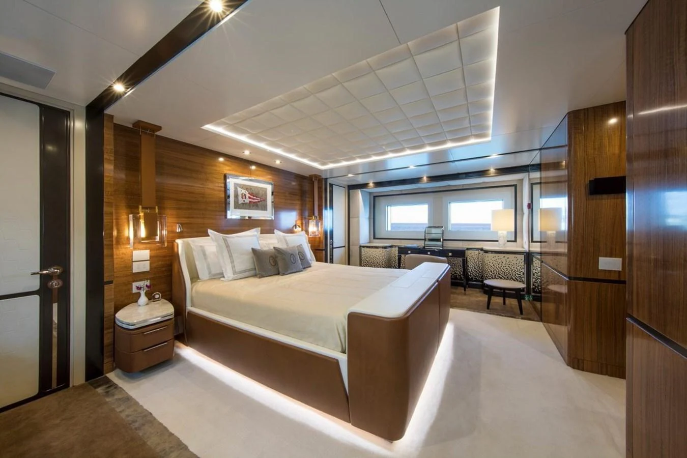a room with a bed and a desk aboard SPRING Yacht for Sale