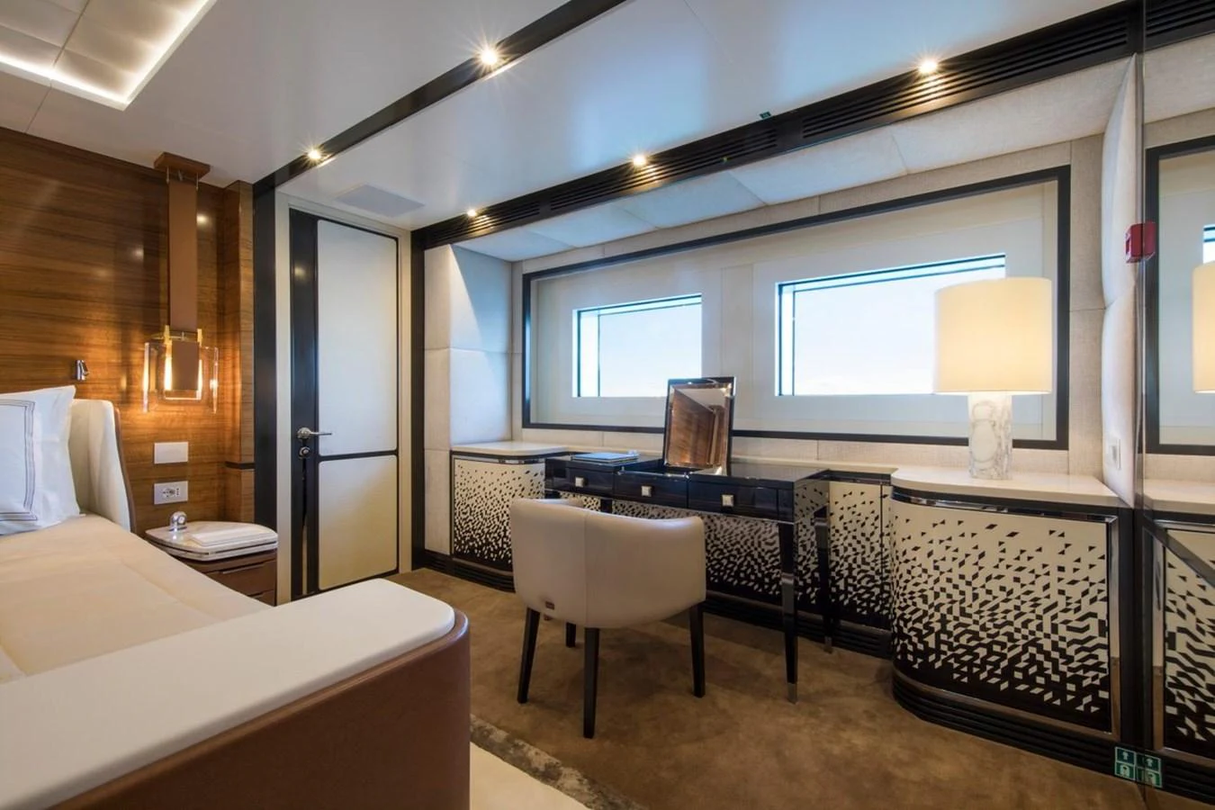 a room with a table and chairs aboard SPRING Yacht for Sale