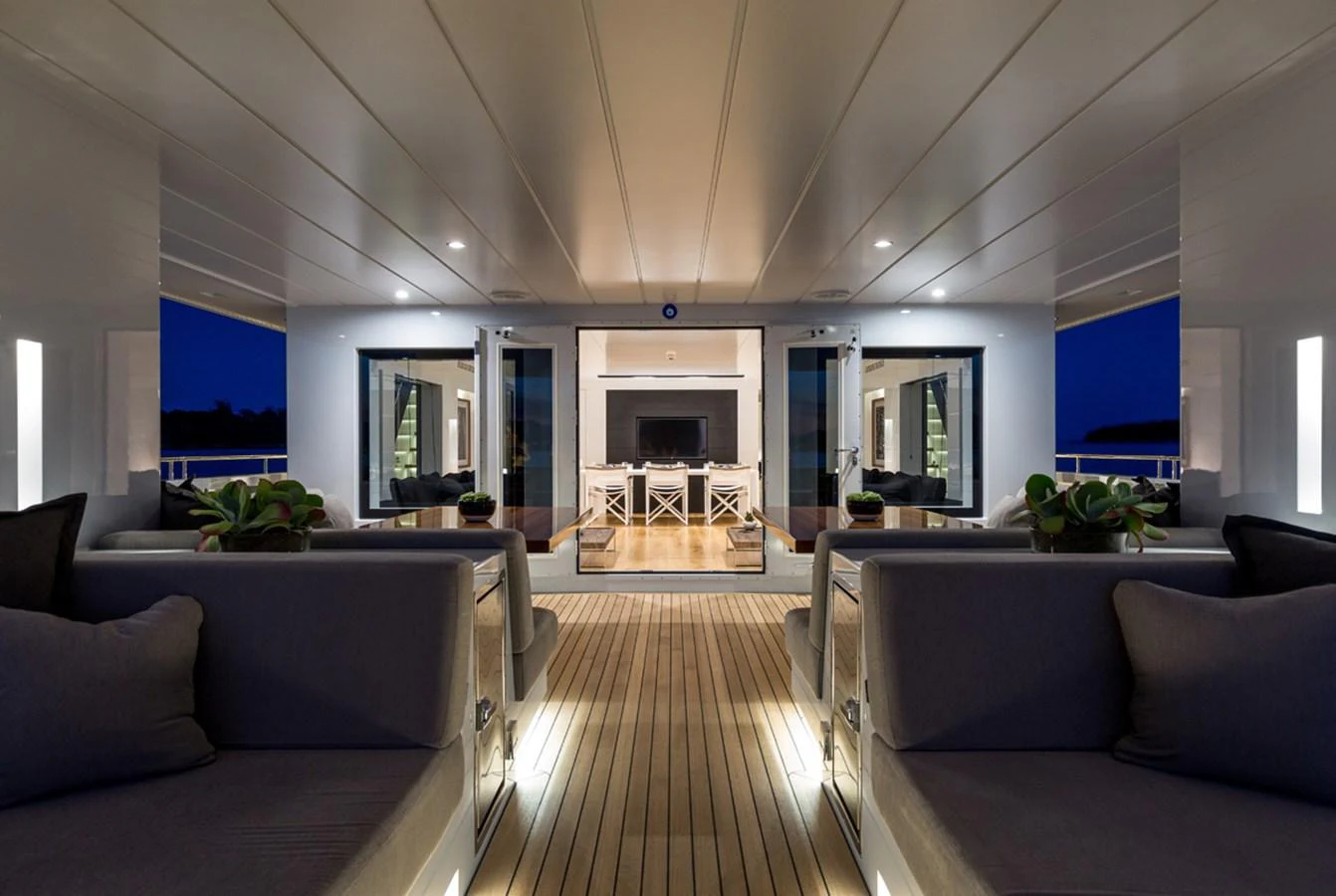 a living room with a wood floor aboard S7 Yacht for Sale