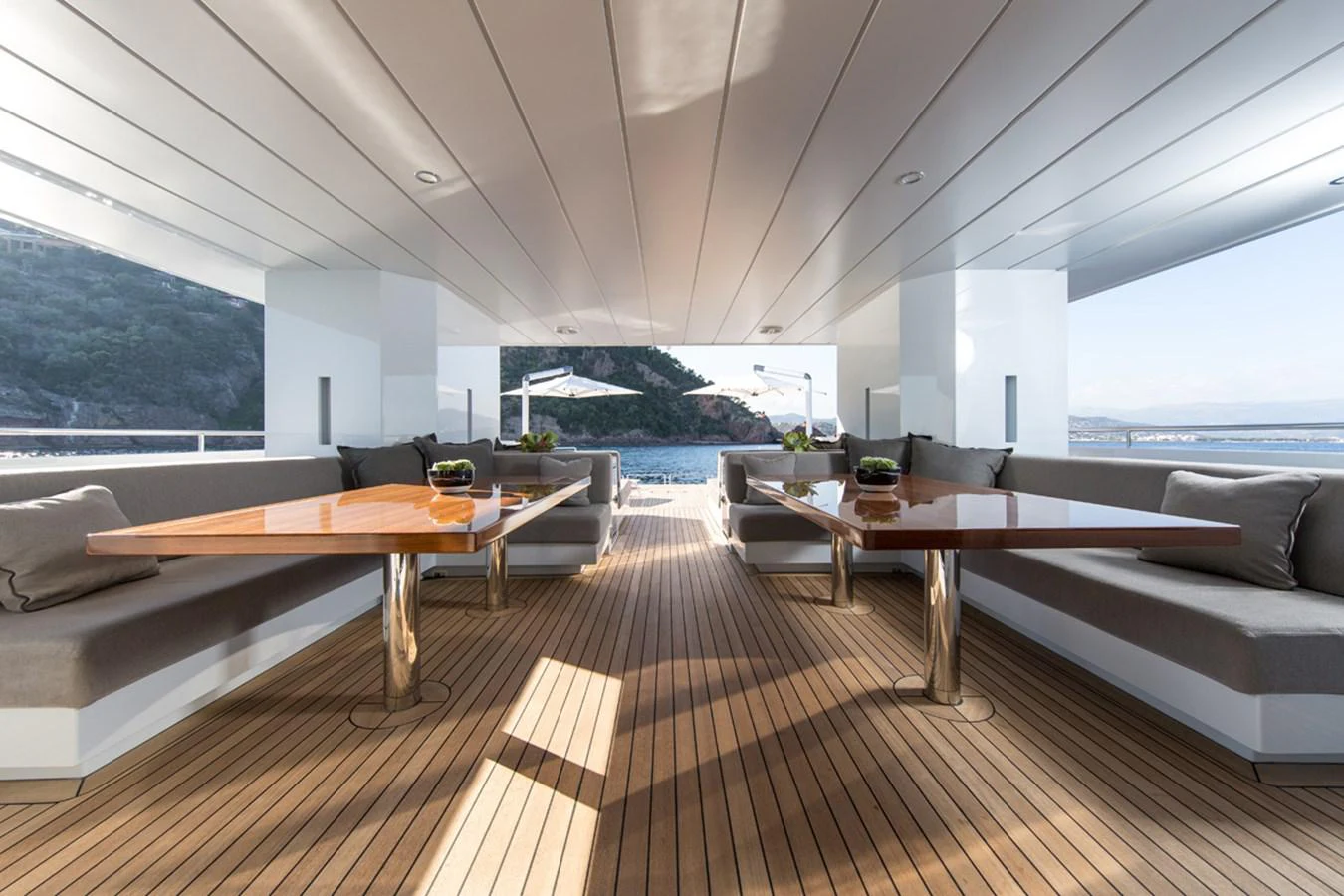 a living room with a wood floor aboard S7 Yacht for Sale