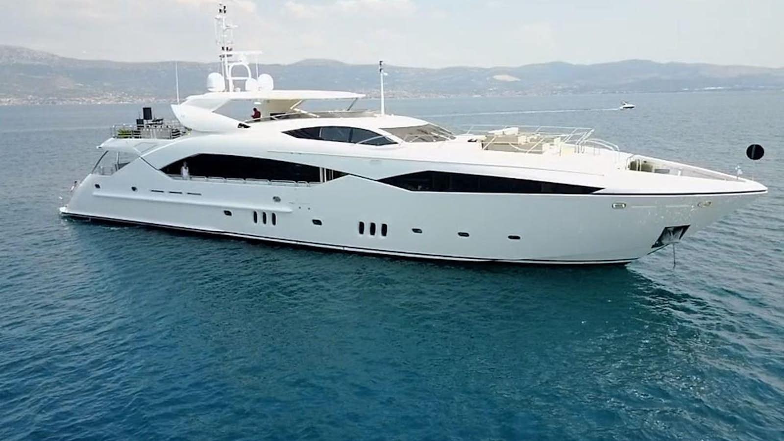 a white yacht in the water aboard REGULUS Yacht for Sale