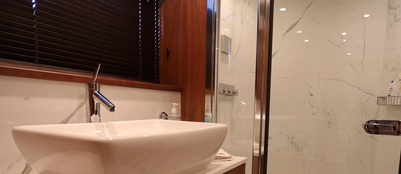a sink and a shower aboard J & LI Yacht for Sale