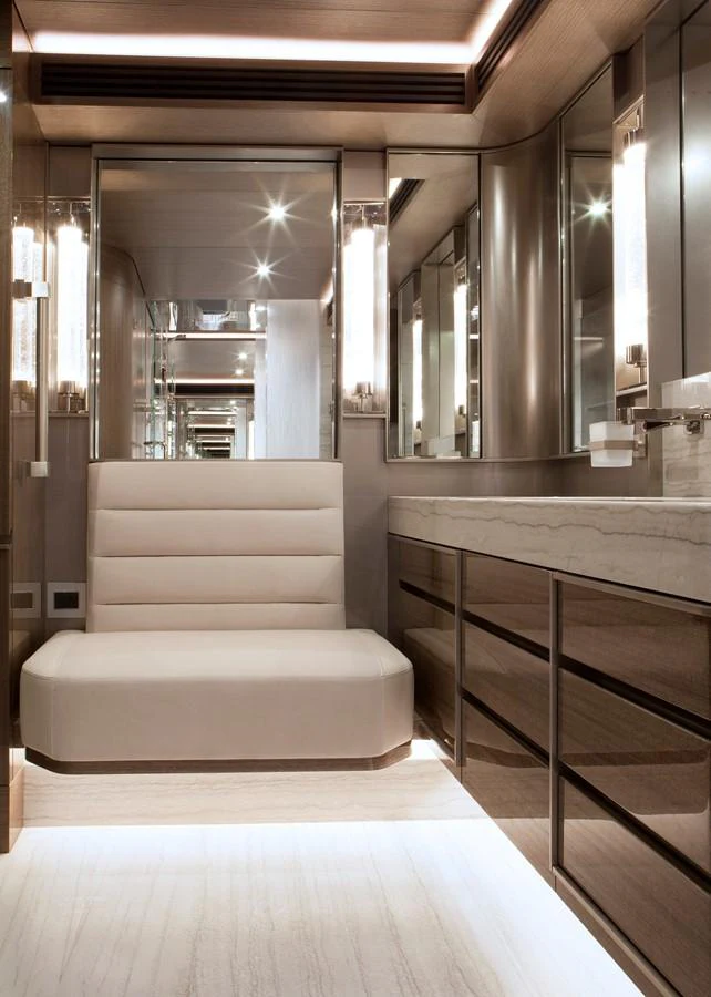 a room with a couch and a table aboard PEPPER XIII Yacht for Sale
