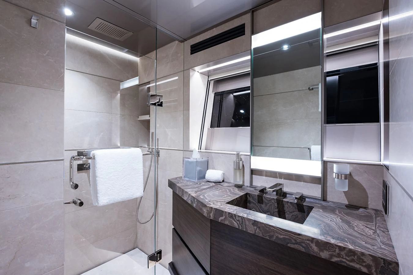 a bathroom with a sink and a mirror aboard PEPPER XIII Yacht for Sale