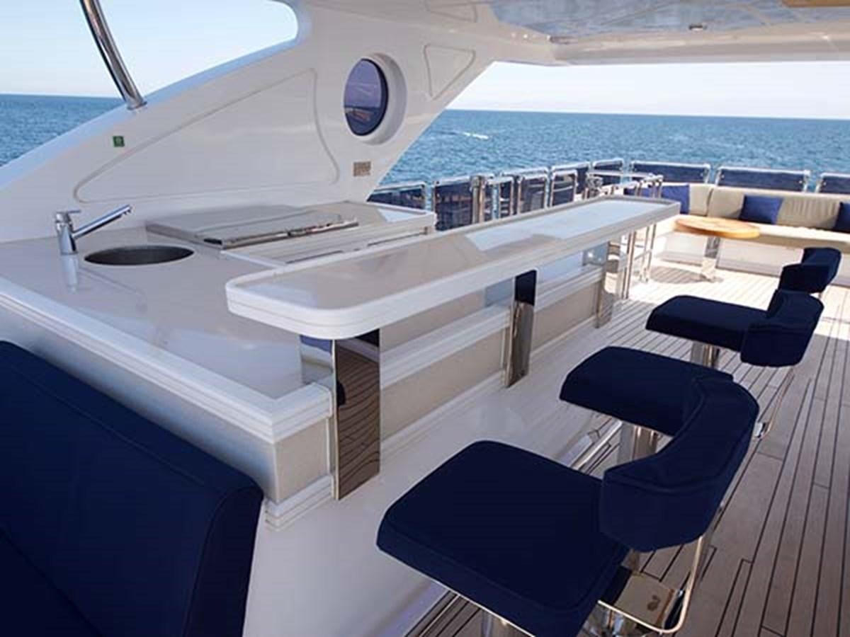 a boat with a large deck aboard AL WASMY I Yacht for Sale