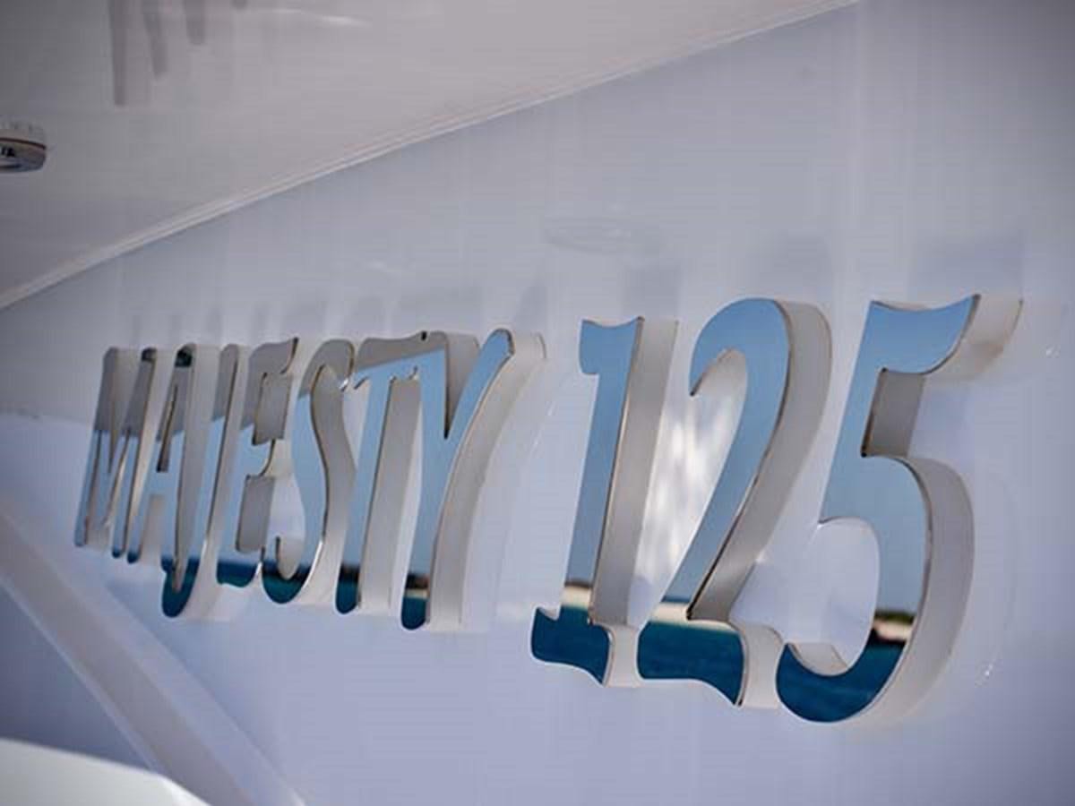 a close-up of a logo aboard AL WASMY I Yacht for Sale