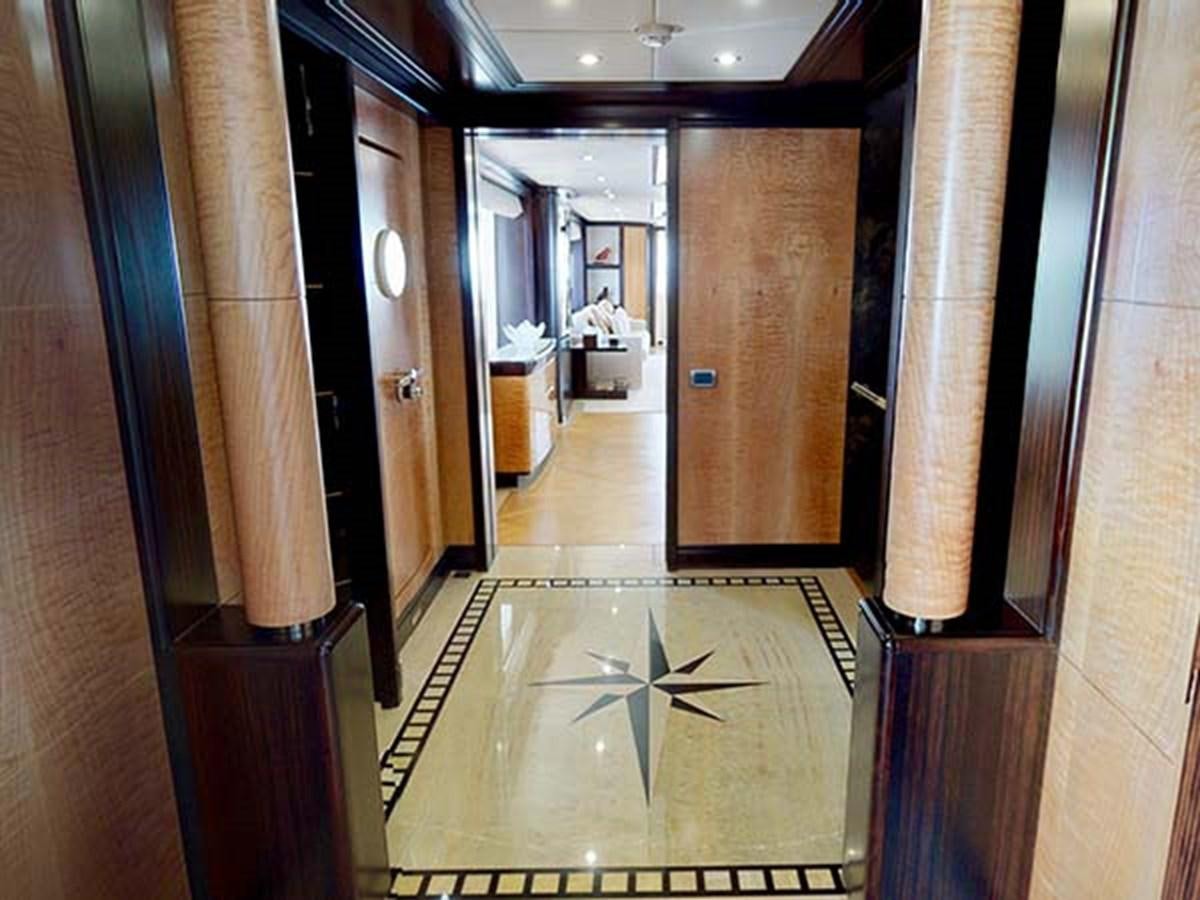 a hallway with doors and windows aboard AL WASMY I Yacht for Sale