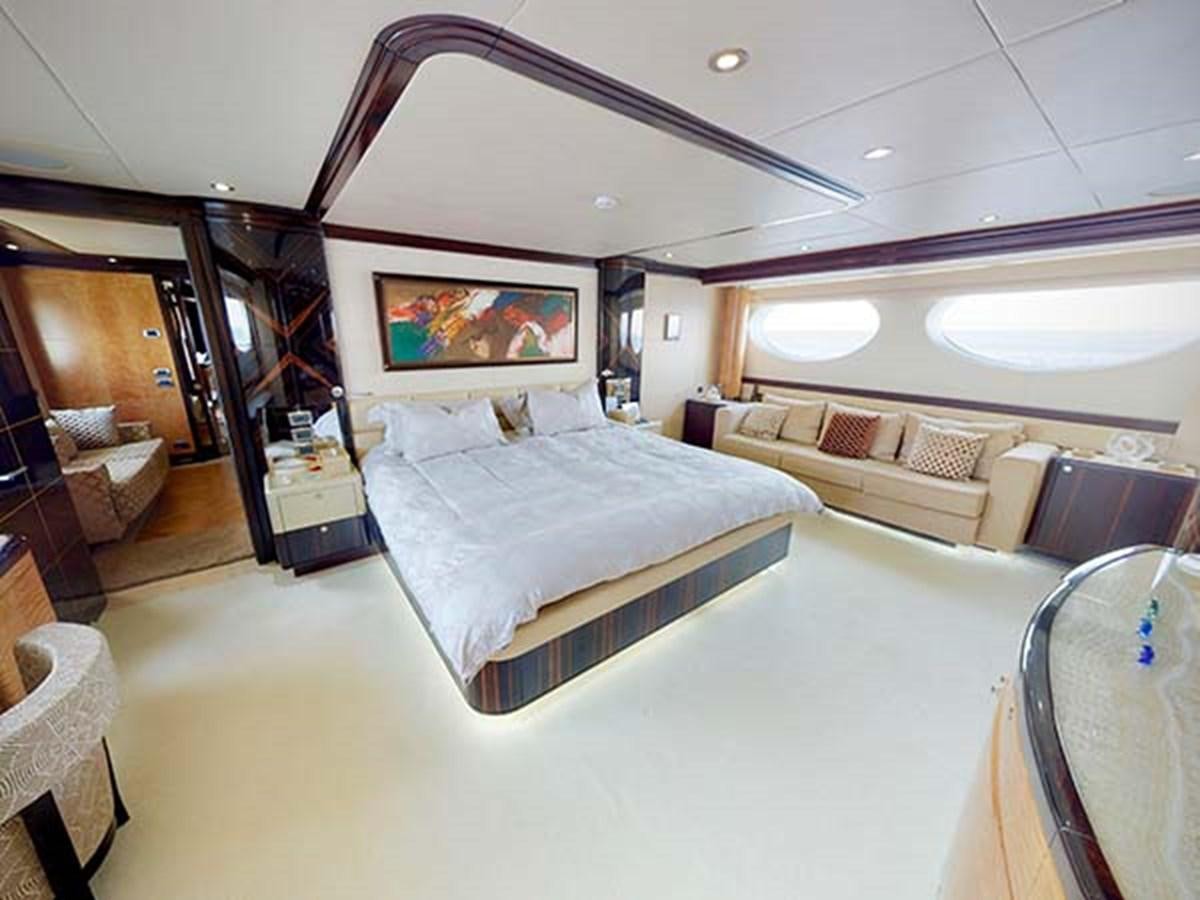 a room with a bed and a couch aboard AL WASMY I Yacht for Sale