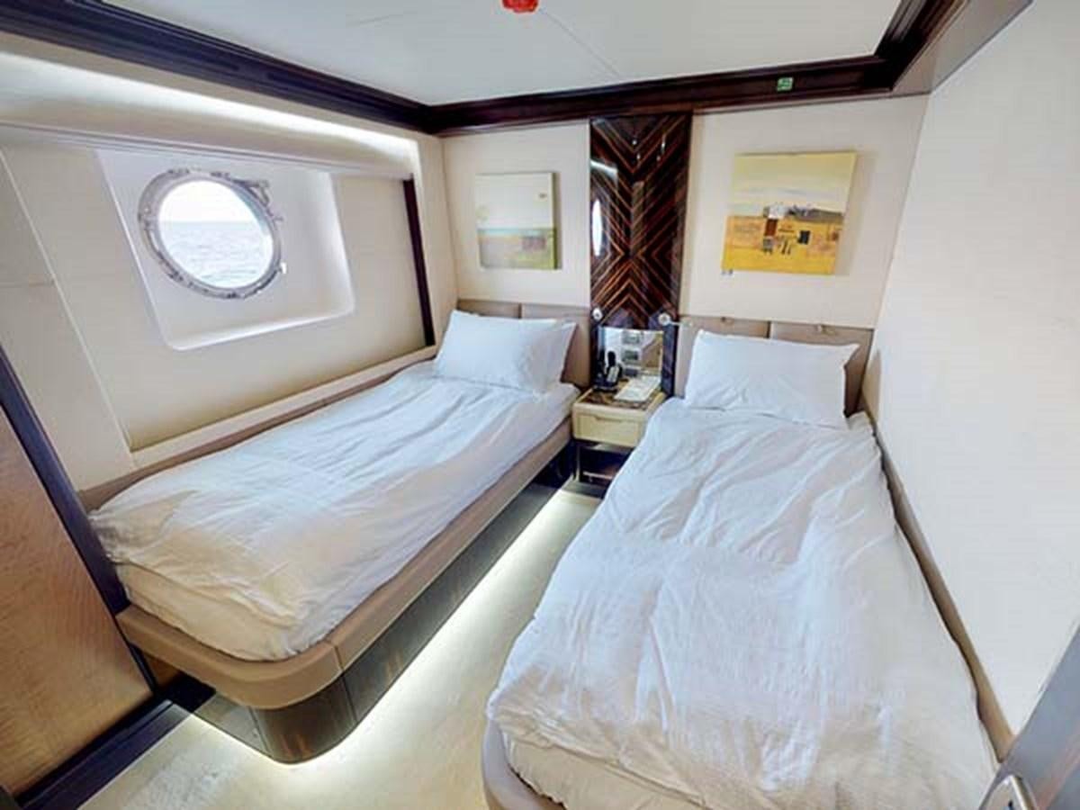 a couple of beds in a room aboard AL WASMY I Yacht for Sale