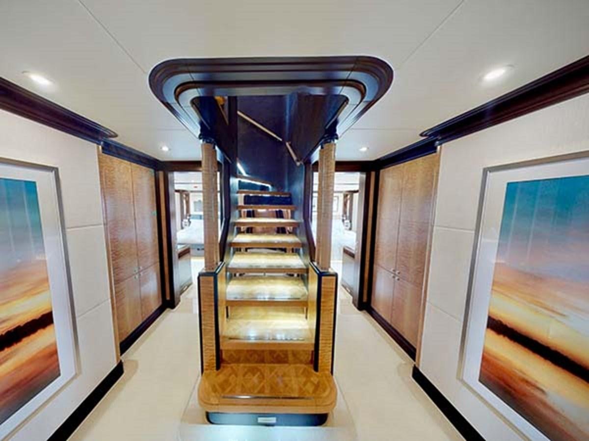 a wooden staircase in a room aboard AL WASMY I Yacht for Sale