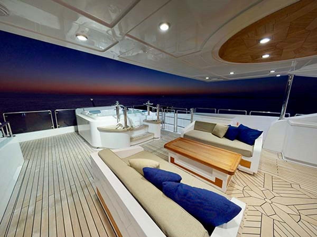 a large room with a large pool aboard AL WASMY I Yacht for Sale