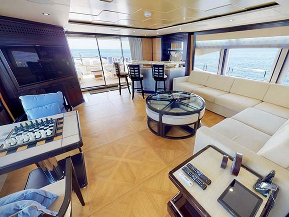 a living room with a piano aboard AL WASMY I Yacht for Sale
