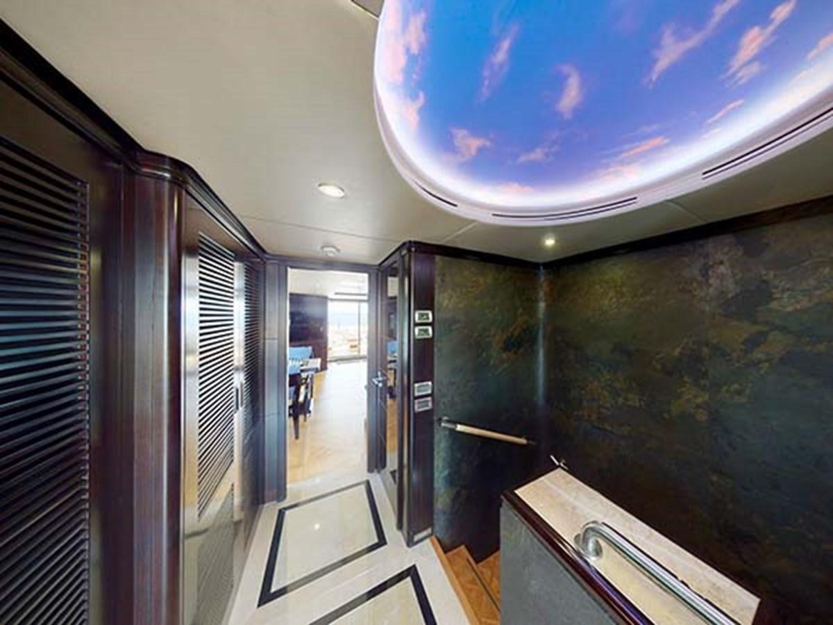 a hallway with doors aboard AL WASMY I Yacht for Sale