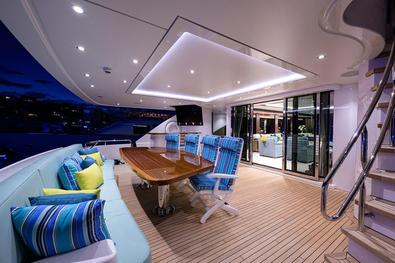 a room with a table and chairs aboard MARSHA KAY Yacht for Sale