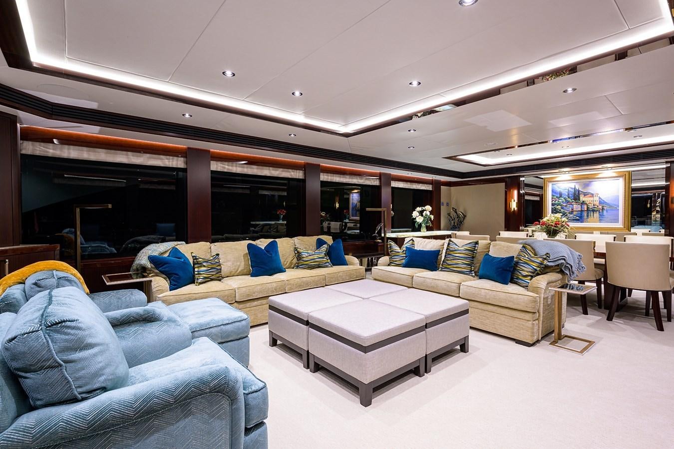 a living room with a couch and a table aboard MARSHA KAY Yacht for Sale