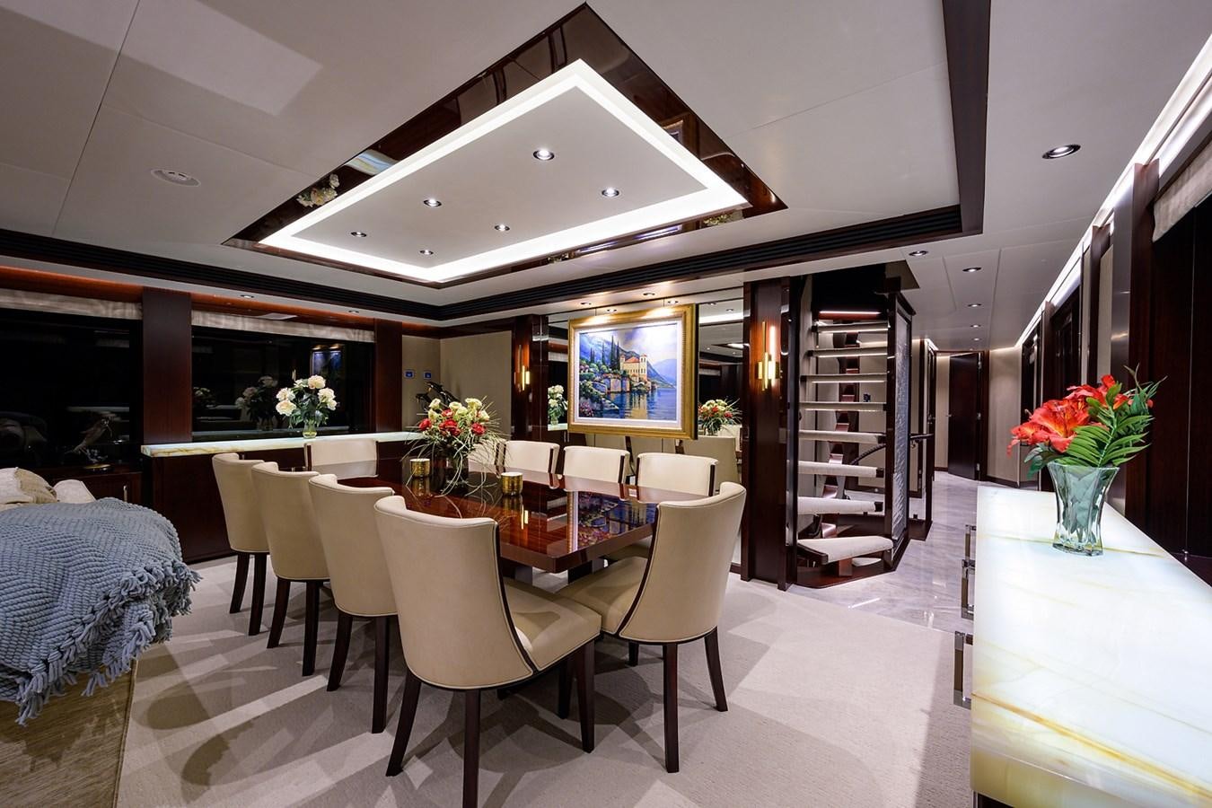 a room with tables and chairs aboard MARSHA KAY Yacht for Sale