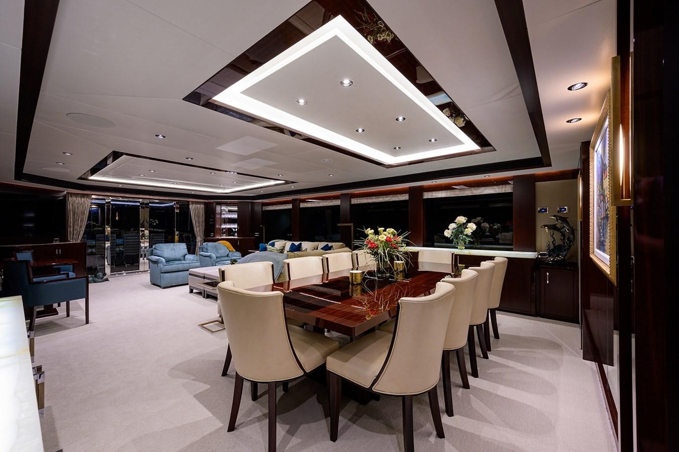 a room with tables and chairs aboard MARSHA KAY Yacht for Sale