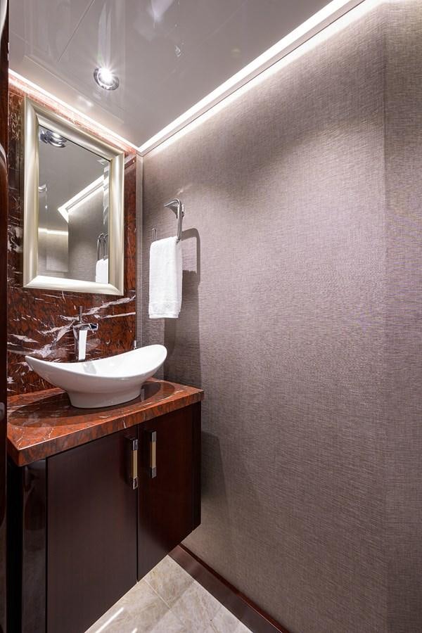 a bathroom with a sink and a mirror aboard MARSHA KAY Yacht for Sale