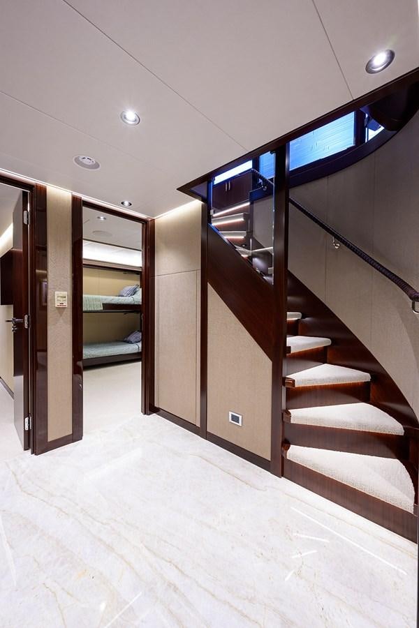 a set of stairs leading to a room with a glass door aboard MARSHA KAY Yacht for Sale