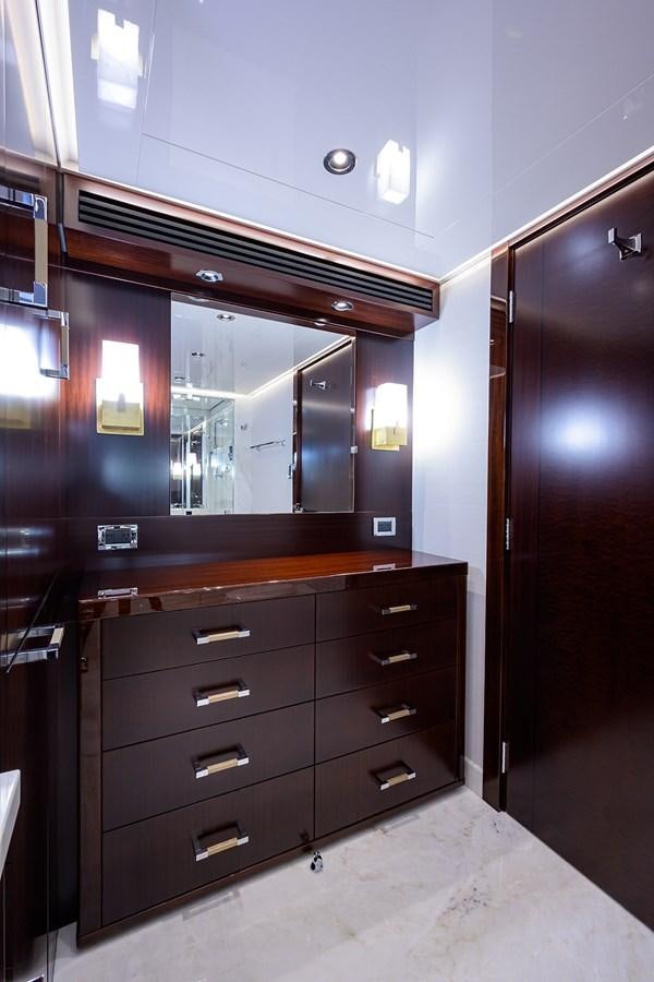 a room with a mirror and cabinets aboard MARSHA KAY Yacht for Sale