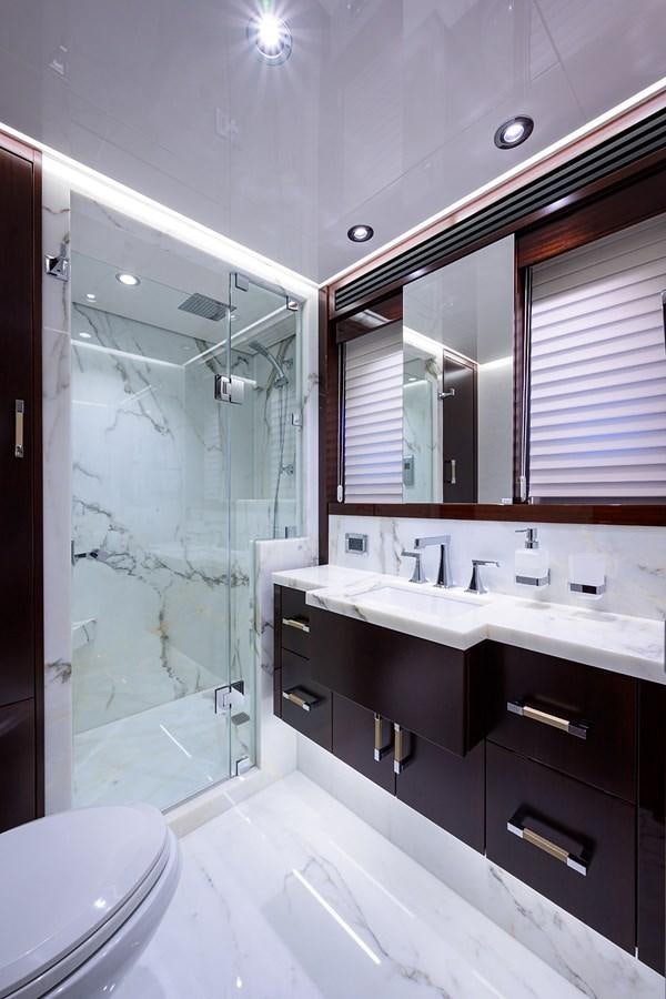 a bathroom with a sink and a mirror aboard MARSHA KAY Yacht for Sale