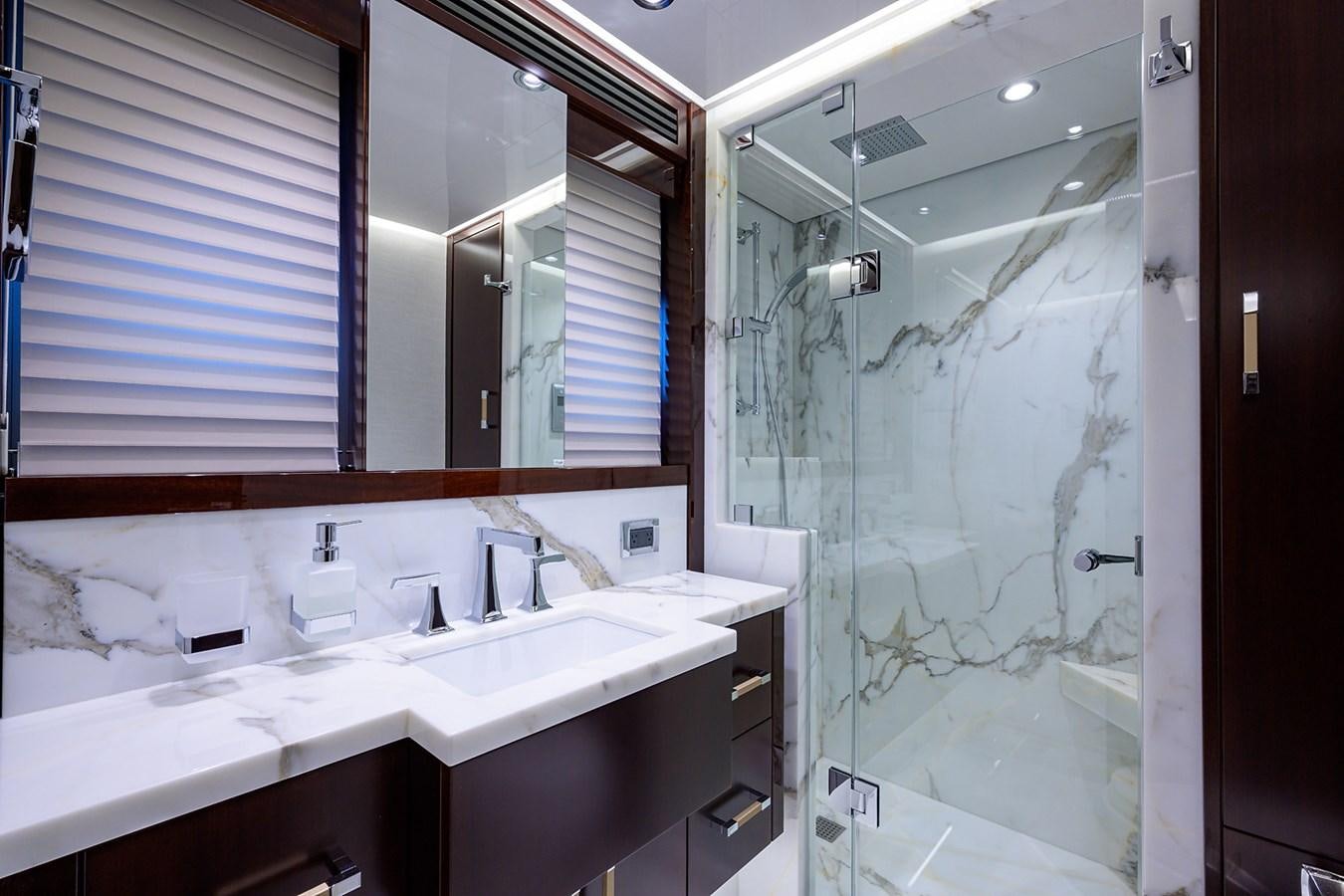 a bathroom with a large mirror aboard MARSHA KAY Yacht for Sale