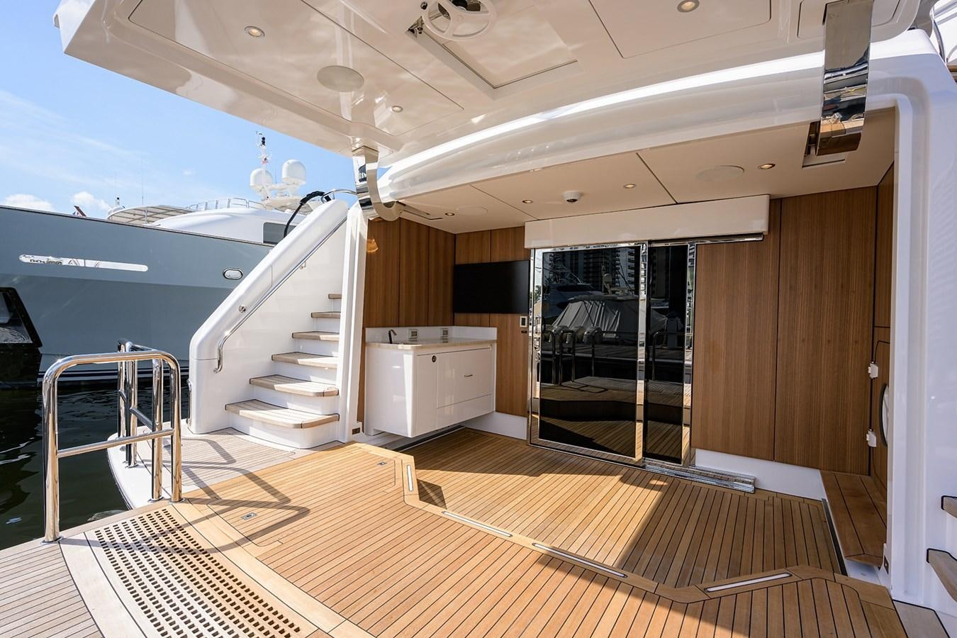 a large room with a deck and a large deck aboard MARSHA KAY Yacht for Sale